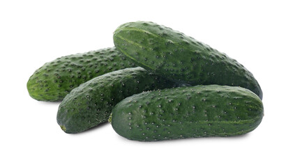 Whole fresh green cucumbers on white background