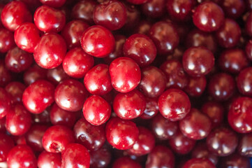 Cherries background. Cherry with drops. Food background.