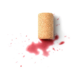 Bottle cork with wine stains isolated on white, top view