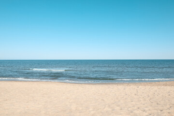 Picturesque view of sandy beach near sea