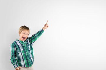 Child smiling happy student keeps pointing finger, Portrait little children boy preschool, Back to school