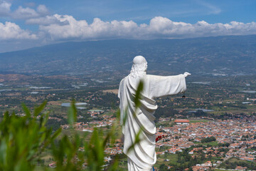 Mirador El Santo and its statue of Jesus Villa de Leyva cityscape of Boyacá in Colombia, South America - obrazy, fototapety, plakaty