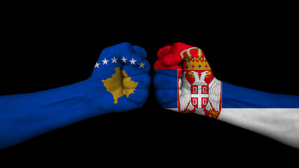 Serbia vs Republic of Kosovo. Two fists with national flags for military conflict. On black...