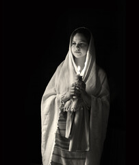 Young girl with candles in her hands