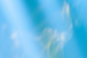 Blurred water texture overlay effect for photo and mockups. Organic drop diagonal shadow and light caustic effect on a blue wall. Shadows for natural light effects