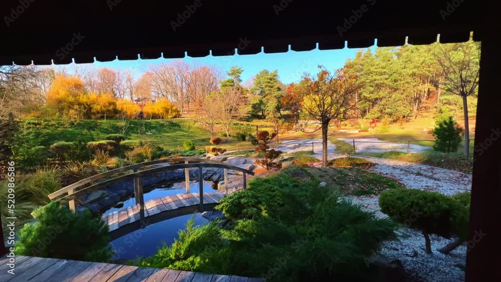 Wall mural The tiny pond with a bridge in Japanese Rodzi Tea Garden, Kyiv, Ukraine