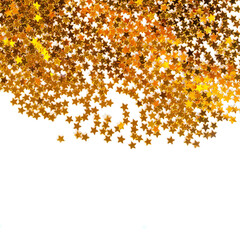 Golden stars falling on a white background
