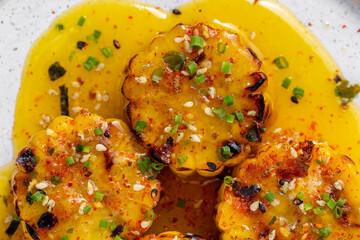 Grilled corn in mango sauce