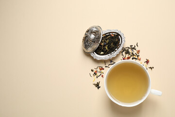 Flat lay composition with green tea on beige background. Space for text