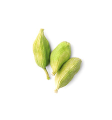 Dry green cardamom pods on white background, top view