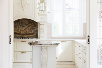 Fototapeta na wymiar interior design of a modern and stylish bright kitchen in the house