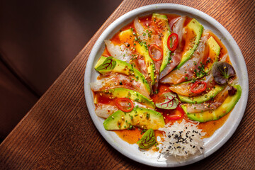 Sashimi with squid meat, avocado, octopus, sesame seeds