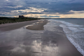 Bamburgh Castle from the south sunset elevated