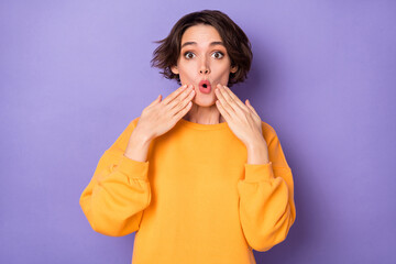 Photo of shocked young lady arms near pouted lips cant believe isolated on violet color background