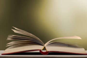 Grunge age book on the wooden desk table space. Retro still life concept