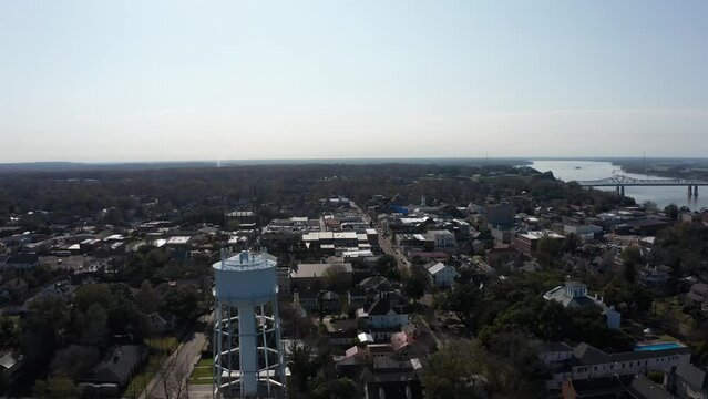 Wide aerial panning shot of Downtown Natchez, Mississippi. 4K