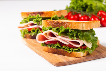 Close-up photo of an American club sandwich. Fast food concept. 