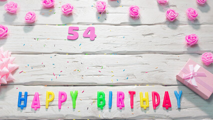 happy birthday candle letters for a girl in pink shades with beautiful rose flowers, postcard...