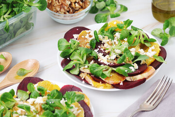 Beetroot and oranges fresh vegetarian salad	