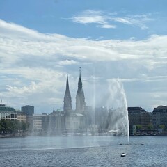 Sightseeing tour on the Alster in Hamburg with a view of the Jungfernstieg