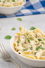 Pasta with cheese and basil