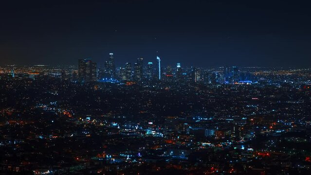 Los Angeles downtown timelapse at night. Big city in the USA. Skyscrapers and street lights with traffic