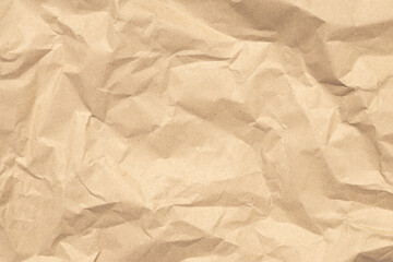 Crumpled paper texture, brown wrapping background. Beige packaging, vintage dirty page. Craft sheet, natural pattern of papyrus. Carton surface close up.
