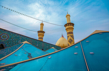 The shrine of Abbas, son of Imam Ali, peace be upon him, in Karbala, Iraq, with Imam Hussein, peace...