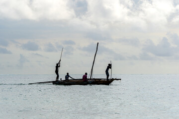 Naklejka premium tradiional african dhow canoes as used for fishing