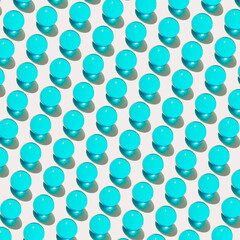 Shiny and glossy abstract background with blue spheres on white.