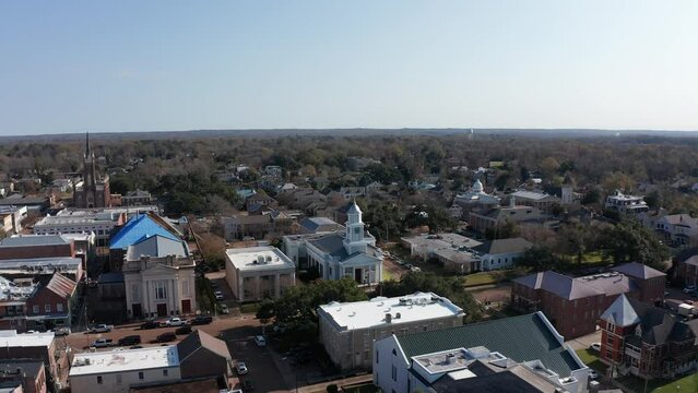 Descending close-up aerial shot of the 19th century First Presbyterian Church in Natchez, Mississippi. 4K