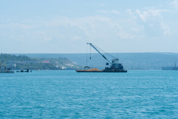 Obraz premium Sand seaport container dock ship shipping sea port industry import, concept freight export from technology from global commercial, sunset rio. Quay equipment docks, ocean