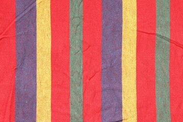 Multicolored fabric texture. Colorful striped background with different colors.