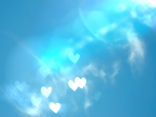 blue sky with sun flares in heart shape sun beam nature  concept banner template background  copy space 