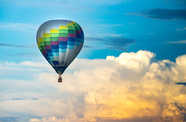 Air balloon in the beautiful sky with clouds.