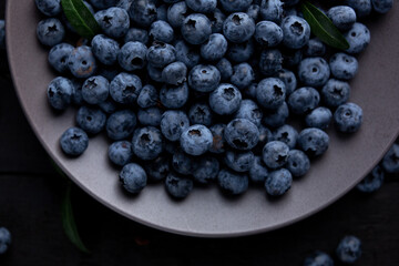 Fresh blueberry background, blueberries with space for text. Vegetarian concept. Berry textures. healthy eating