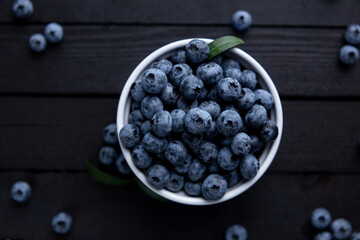 Fresh blueberry background, blueberries with space for text. Vegetarian concept. Berry textures. healthy eating