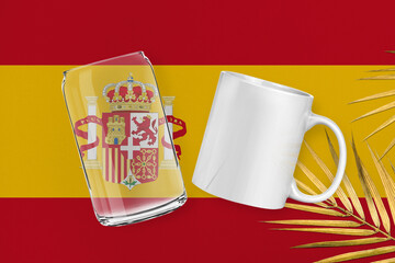 Patriotic can glass and mug mock up on background in colors of national flag. Spain