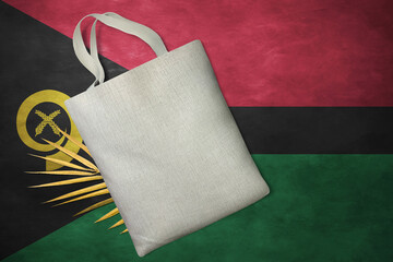 Patriotic tote bag mock up on background in colors of national flag. Vanuatu