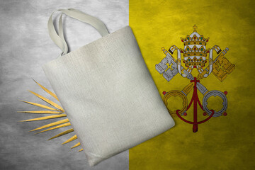 Patriotic tote bag mock up on background in colors of national flag. Vatican City
