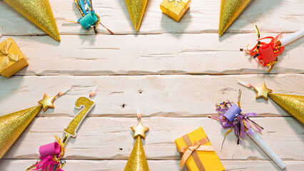 Beautiful colorful card on the background of white boards happy birthday in golden hues copy space. Beautiful ornaments and decorations of gold color festive background. Happy birthday number 7