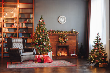 Fototapeta premium Christmas Tree Near Fireplace and Bookshelf. Interior Photo Studio with Christmas Decor