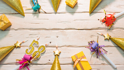 Beautiful colorful card on the background of white boards happy birthday in golden hues copy space. Beautiful ornaments and decorations of gold color festive background. Happy birthday number 58