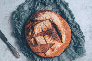 Fresh and delicious bread on the vintage background