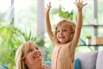 Mother and child together at home