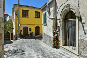 Fototapeta na wymiar A small street between the old houses of Zungoli, one of the most beautiful villages in Italy.