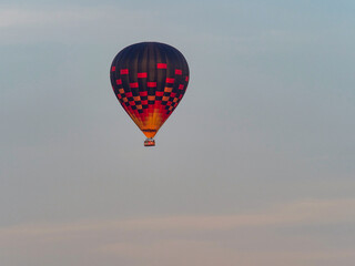 color hot air balloon in blue sky and cloud nature background