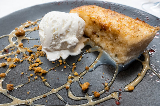 tasty and refreshing dessert typical from spain, torrija with cream ice cream