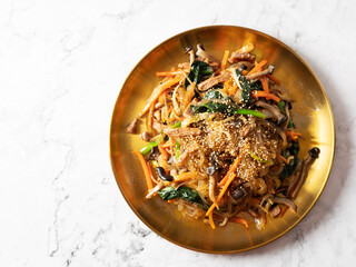 japchae, mixed dish of boiled bean threads, stir-fried vegetables, and shredded meat