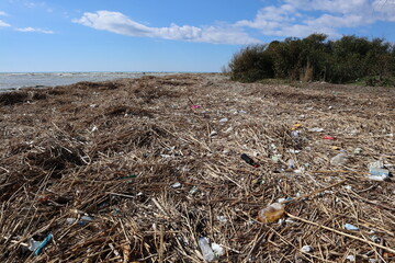 view on beautiful beach called Kumluova Plajı lots of rubbish, Turkey 